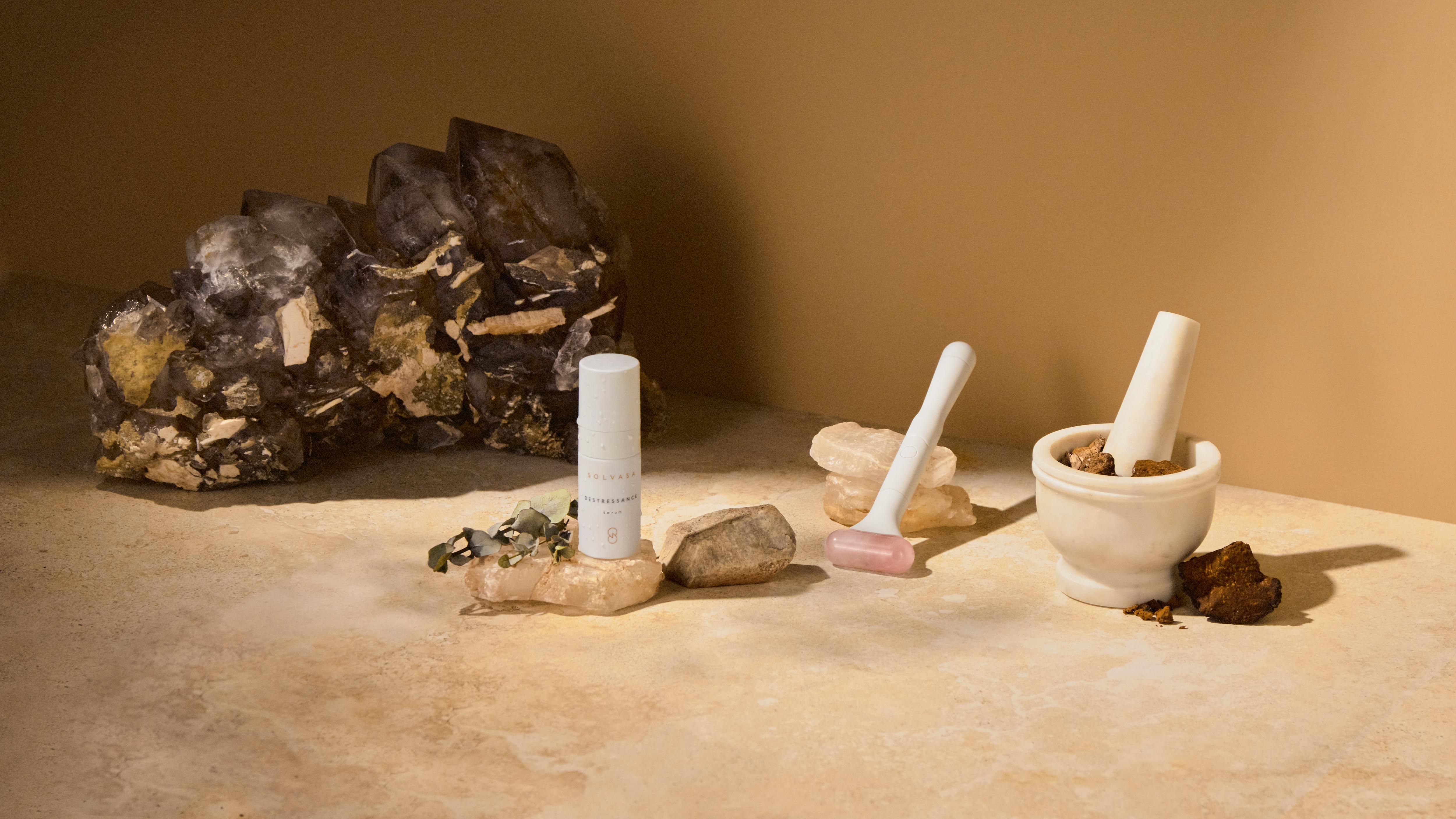 A single green leaf against a white background.